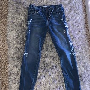 Womens blue jeans with flowers